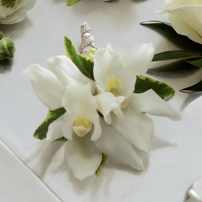 White Mini Cymbidium Boutonniere – MOORE'S FLOWERS & GIFTS, Fayette AL